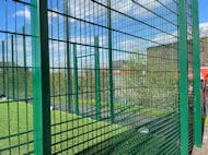 Damage Hole Cut in Mesh Fence Repair 1
